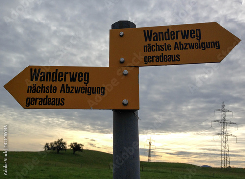 swiss perfectionism - Sign post of swiss hiking trails.