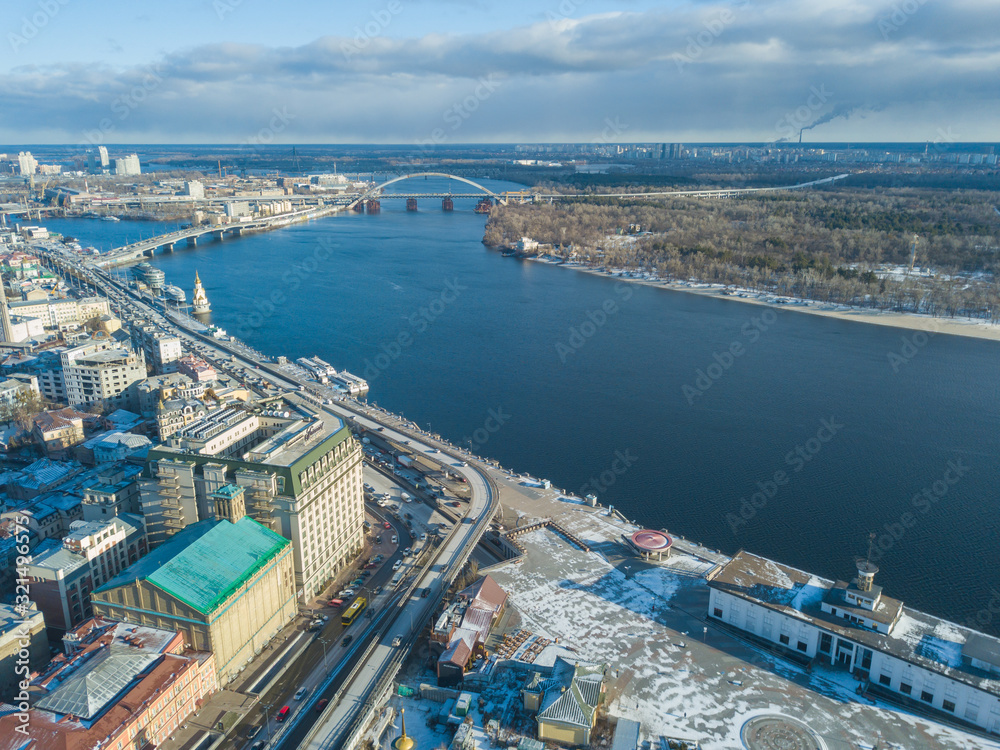 Aerial drone view. View of the Dnieper River in Kiev with a winter morning.