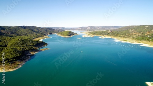 An aerial shot of a beautiful blue lake; a beautiful scenery