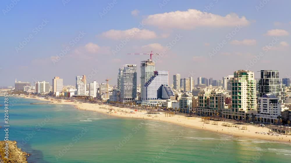 Aerial view of Tel Aviv coastline on a beautiful day over The Mediterranean Sea. Aerial view of Tel Aviv coastline on a beautiful day over The Mediterranean Sea.