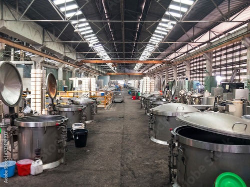 Machines for dyeing industry.Textile Industry, Dyeing Machine Chemical Tanks photo