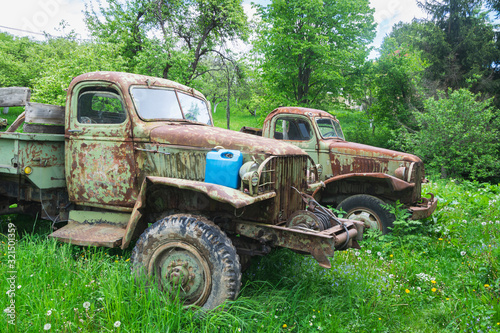 Old and rusty millitary trucks from worl war II.