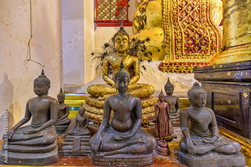 Mueang Sing Buri District, Sing Buri, Thailand, Febuary 1, 2020 : Wat Phra Non Chakkrasi Worawihan is a huge Sukhothai-style reclining Buddha image, which is revered by the local people. photo