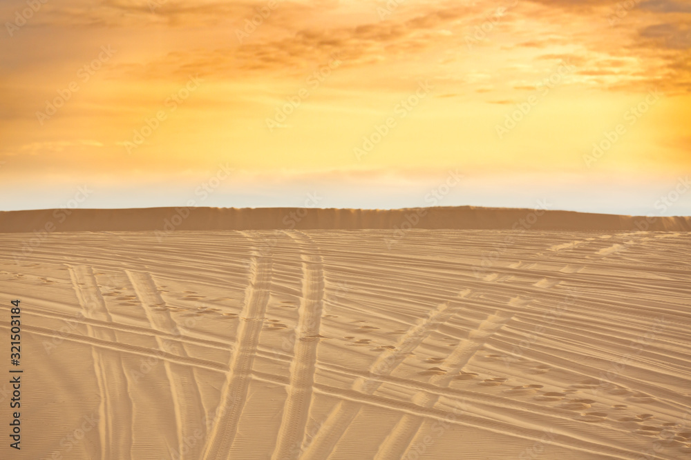Naklejka premium Sand Dunes full off vehicle tracks leaving three distinct paths forward. Choose your path, Follow your path or The right path Concepts. Mui Ne,Vietnam