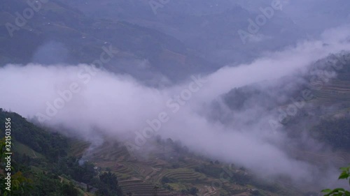 Mist layer flow over valleys , dark dramatic landscape scene, Time-Lapse.