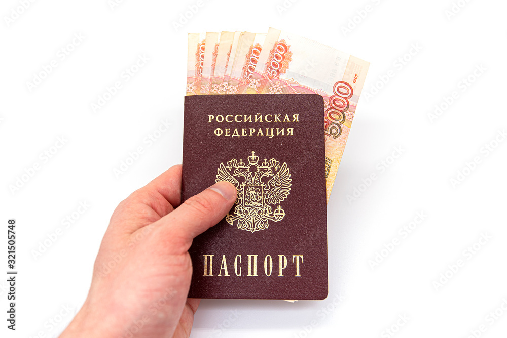 Fototapeta premium Russian Passport and Russian Money, some banknotes of 5000 rubbles, isolated on white Background