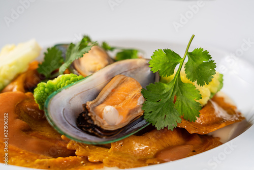 Italian dish with pasta, broccoli and seafood. closeup photo