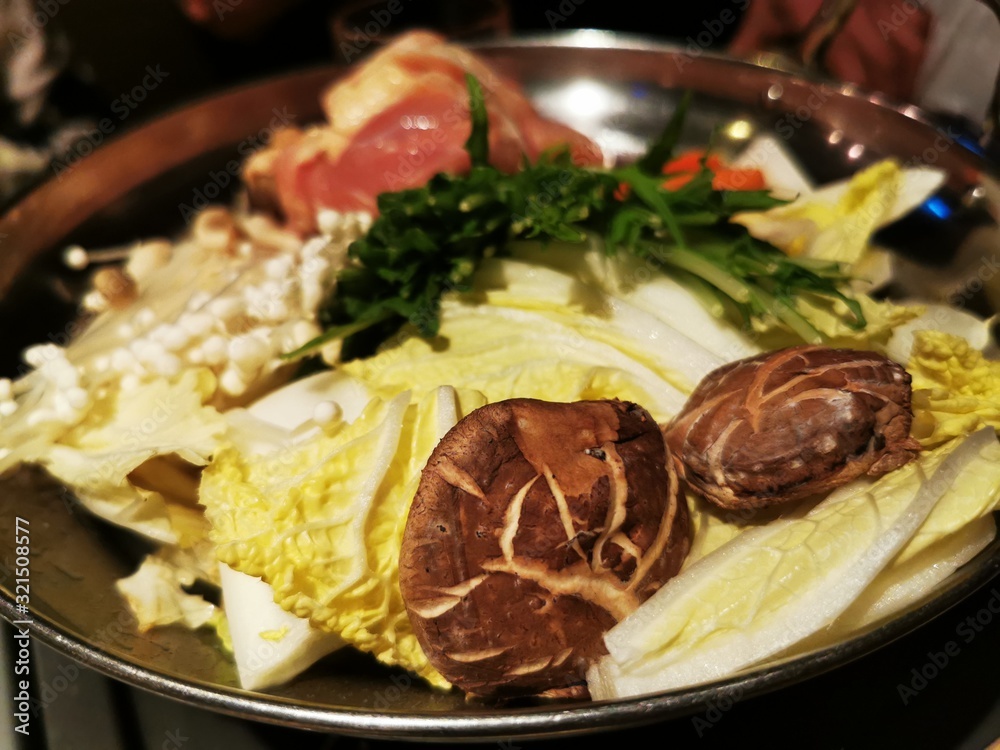the japanese mixed vegetable hot pot soup Shabu in restaurant for dinner meal 