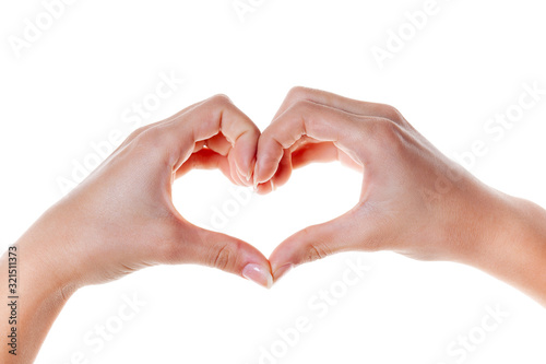 Woman hand making a heart shape. isolated on white