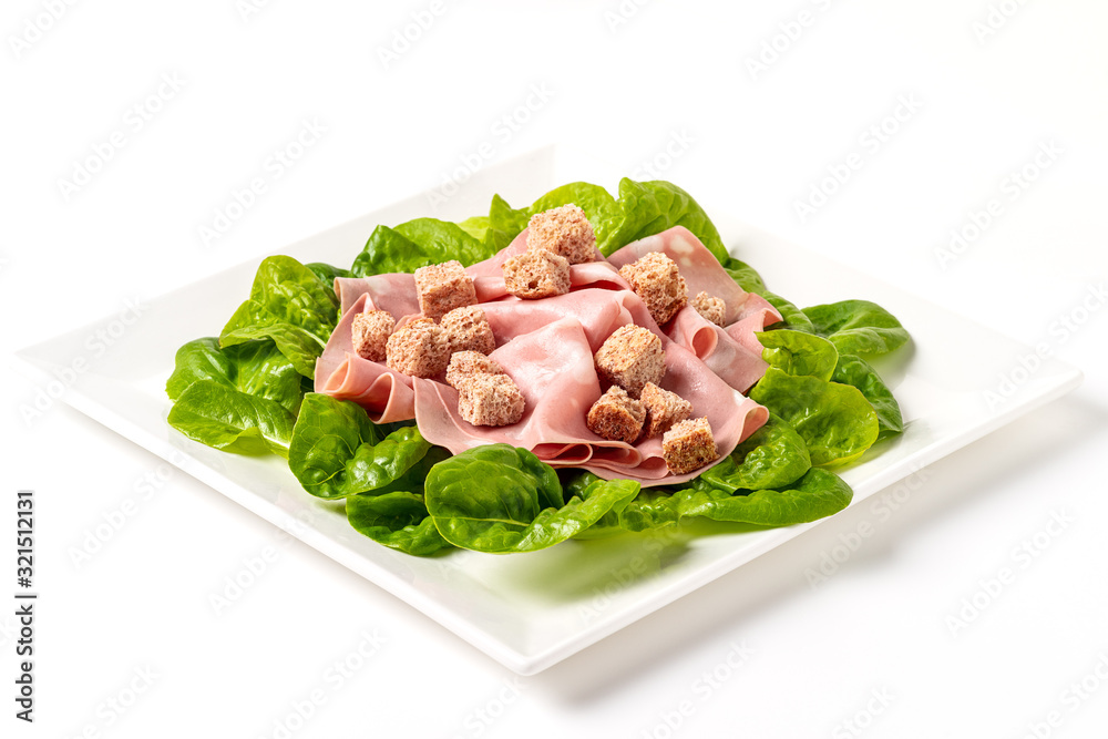 Slice of mortadella on white background Slice of mortadella on white background