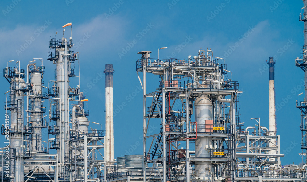 Industrial zone,The equipment of oil refining,Close-up of industrial pipelines of an oil-refinery plant,Detail of oil pipeline with valves in large oil refinery. Industrial zone,The equipment of oil refining,Close-up of industrial pipelines of an oil-refinery plant,Detail of oil pipeline with valves in large oil refinery.