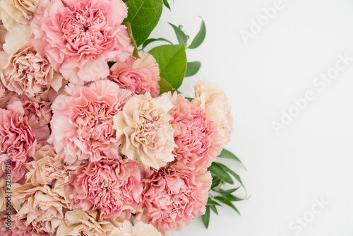 Floral blush and pink carnation flat lay flower background photo