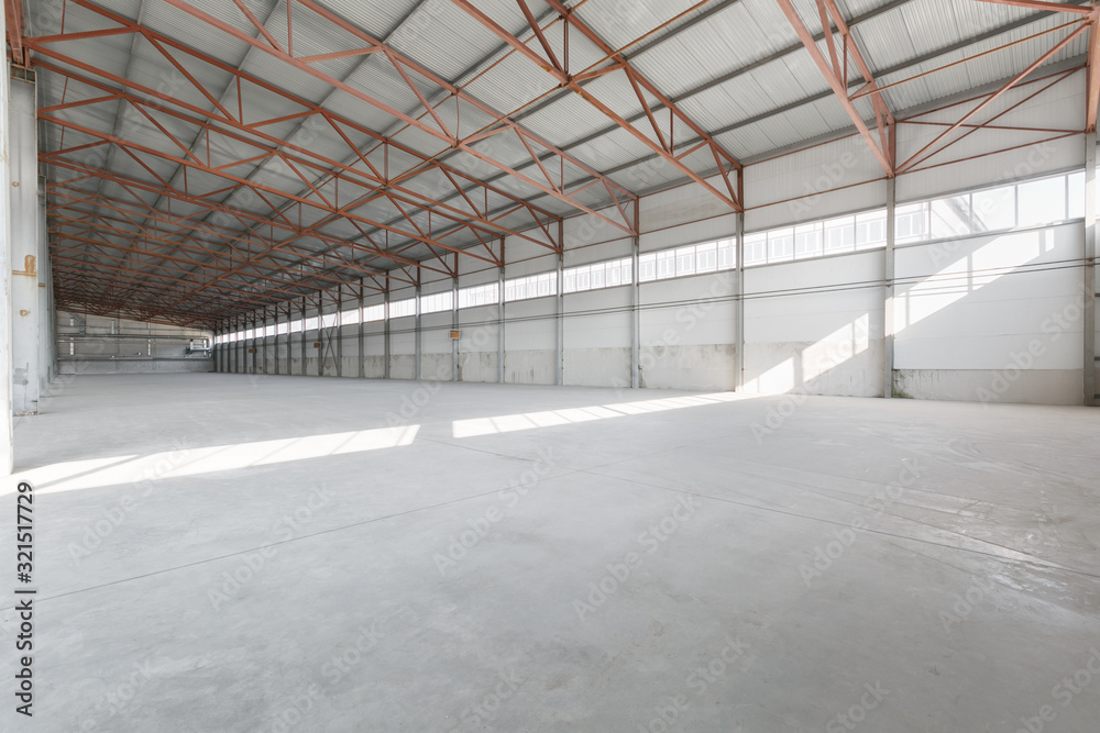 Interior of empty warehouse or garage Interior of empty warehouse or garage