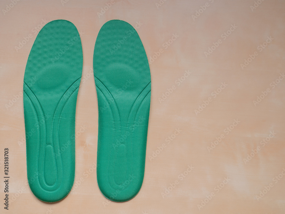 Insoles for shoes on white background. copy space for text Insoles for shoes on white background. copy space for text