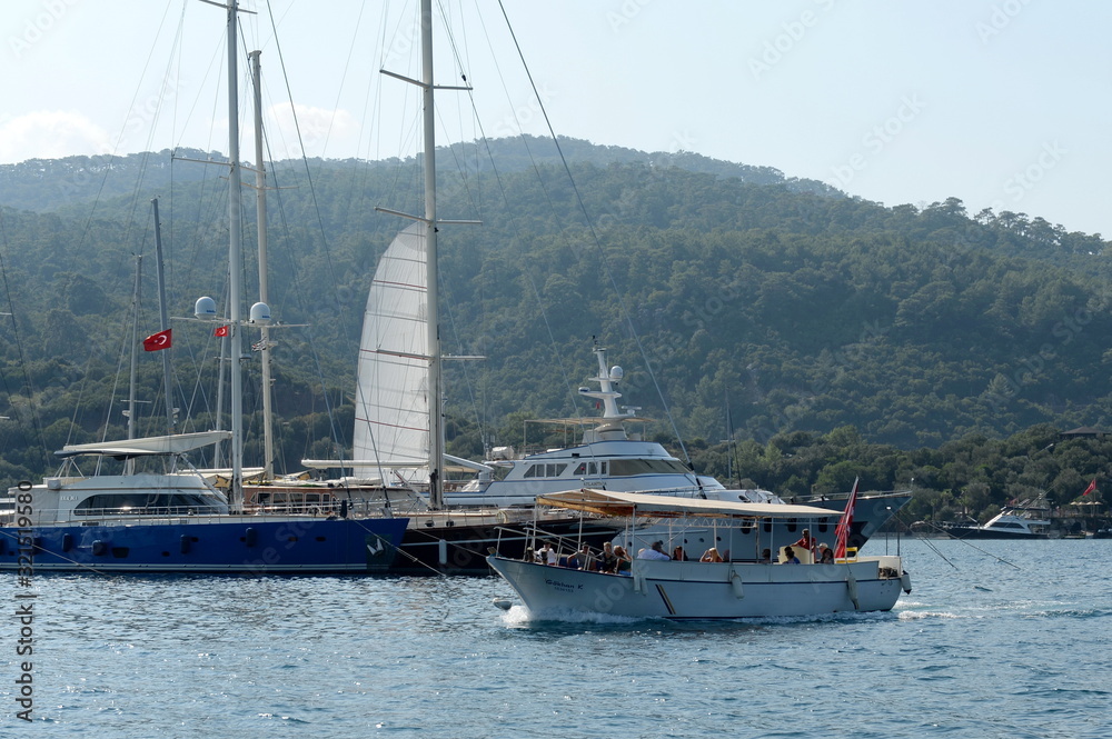 Tourists on a pleasure boat in the Harbor of the Turkish city of Marmaris