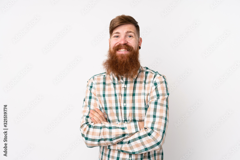 Redhead man with long beard over isolated white background keeping the arms crossed in frontal position Redhead man with long beard over isolated white background keeping the arms crossed in frontal position