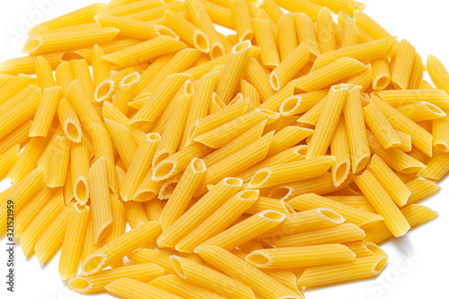 yellow Italian pasta made from durum wheat on a white background