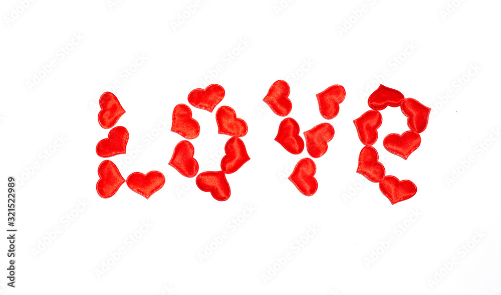 red hearts laid out the word love