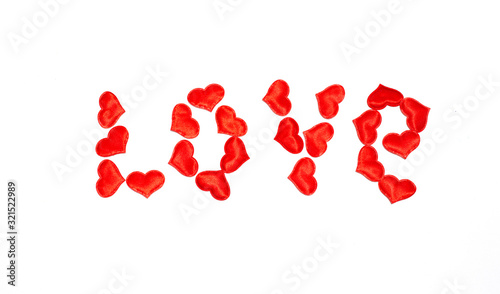 red hearts laid out the word love