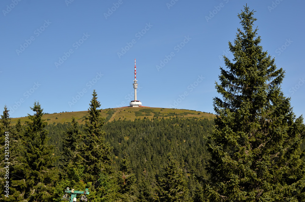 Obraz premium television tower on the hill praded in czech republic from distance