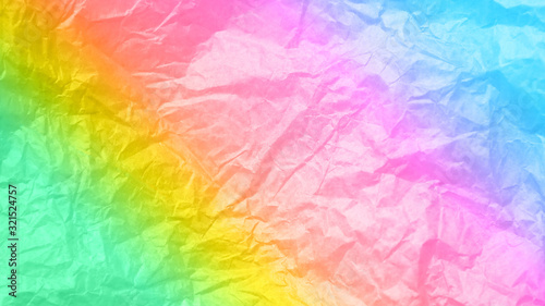 Rumpled rainbow background. Real texture of the wrapping texture.