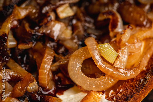 Tableau sur toile Homemade pizza with goat cheese, caramelized onion and balsamic vinegar
