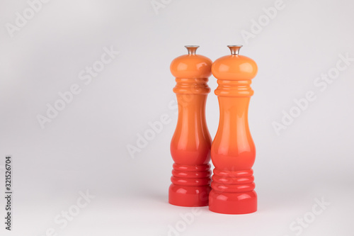 Salt Pepper Mill, Signature Red and orange mill isolated on white background, copy space