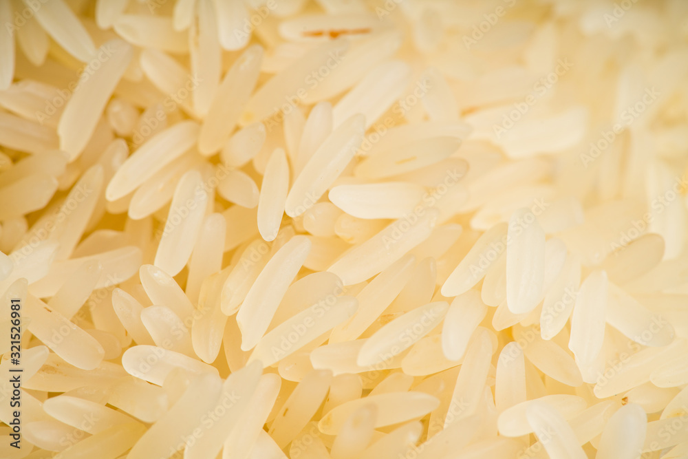Raw rice on the kitchen table. Selective focus. shallow depth of field. Raw rice on the kitchen table. Selective focus. shallow depth of field.