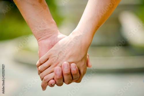 Men and women shake hands with love on valentines day