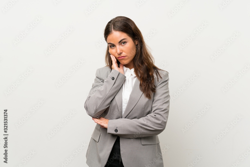 Young business woman over isolated white background unhappy and frustrated Young business woman over isolated white background unhappy and frustrated