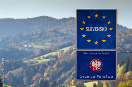 Borders inside Schengen Area between Slovakia and Poland. Best European Community Road Sign indicating National Border of European Union country, near town Piwniczna-Zdroj and Mnisek nad Popradom.