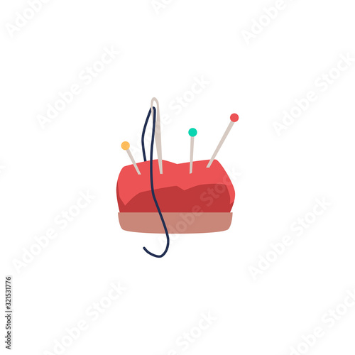 Red cartoon pin cushion with colorful pins and sewing needle with thread