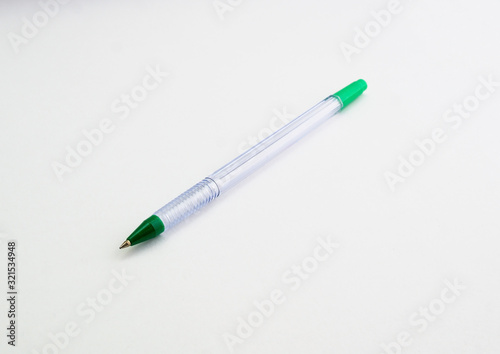 glass ballpoint pen on white background