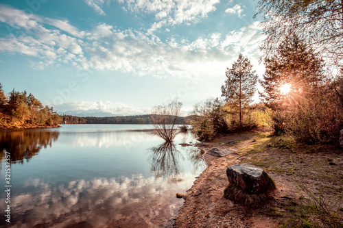 View of Forstsee at sunset, Carinthia, Austria photo