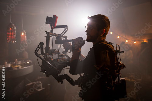 Cameraman at work on movie set