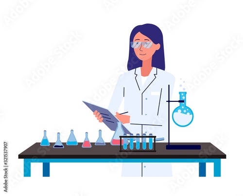 Female chemistry scientist standing behind science laboratory equipment desk