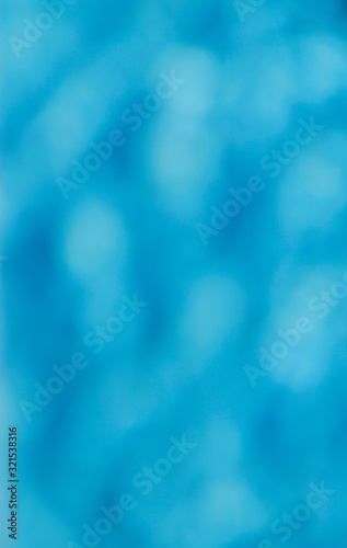 Blurry abstract blue colors. Colorful abstract background. Background texture. Abstract blue backdrop. Blur image of blue water in the pool. Vertical  free space.