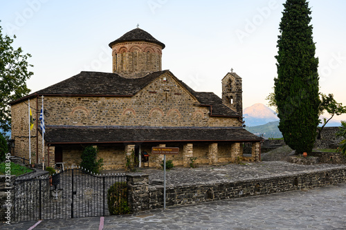 View of the greek-orthodox Church of the Holy Apostles in the village of Molivdoskepastos, in Epirus, Greece photo