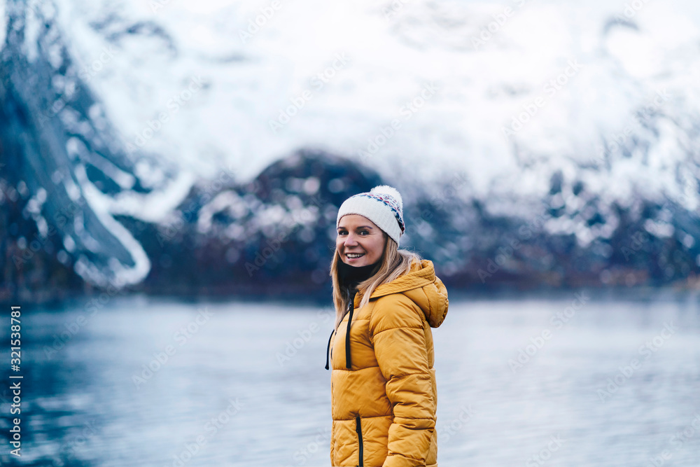 Portrait of happy tourist at Hamnoy, Lofoten, Norway
