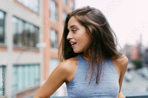 USA, New York City, brunette young woman turning away photo