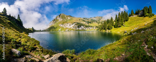 Germany, Bavaria, Allgaeu Alps, Oberstdorf, Seealpsee in mountain landscape photo