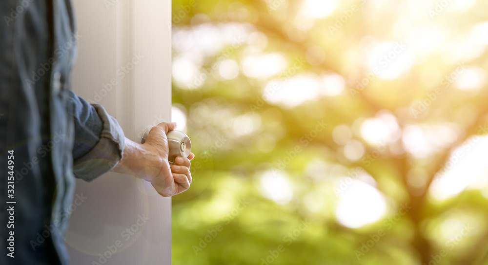 Hand open the door to find nature view.Explorer for opportunity and successful concept. Hand open the door to find nature view.Explorer for opportunity and successful concept.