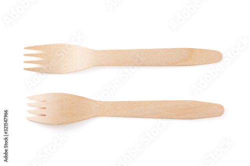 Eco-friendly materials. Wooden, disposable spoon on a white background.