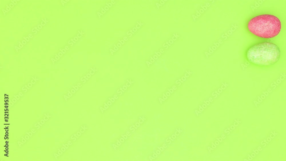 Chicken Easter eggs appear and disappear from right and bottom of green background - Stop motion Chicken Easter eggs appear and disappear from right and bottom of green background - Stop motion