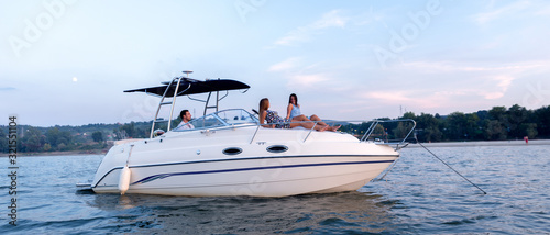Friends enjoying on the boat