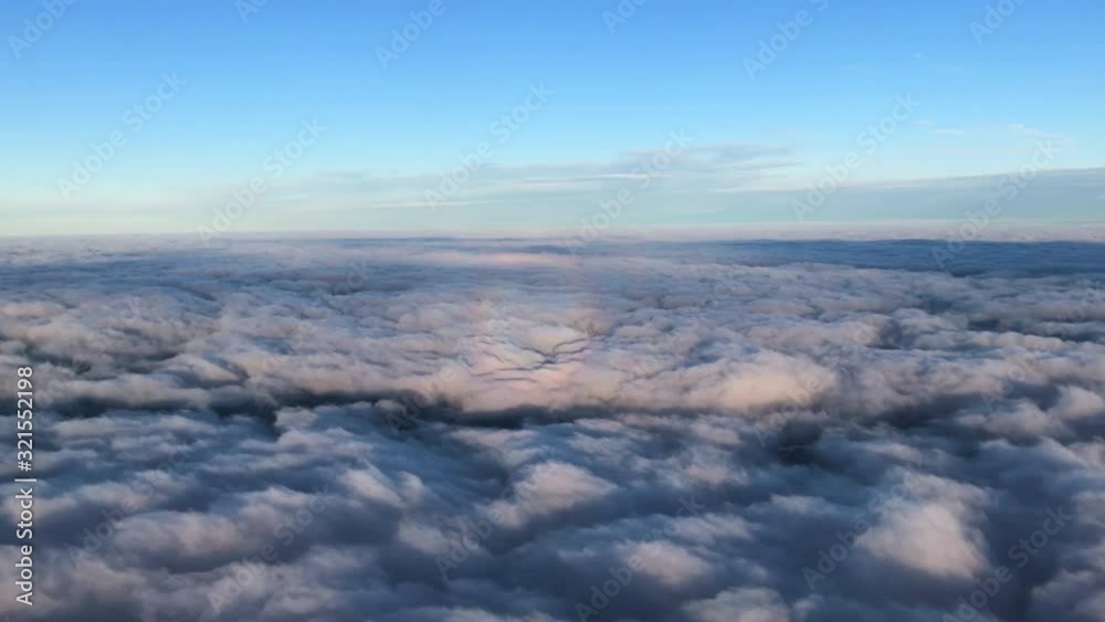 Flying over colorful clouds. Slow motion Flying over colorful clouds. Slow motion