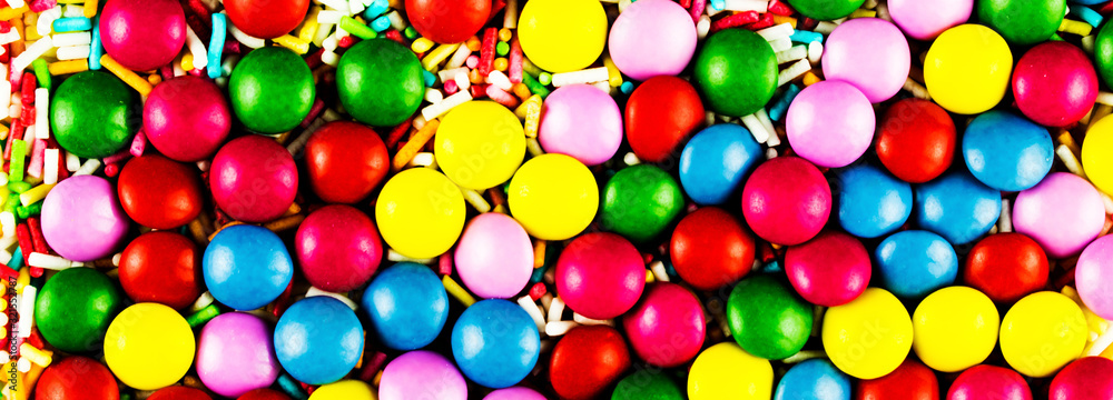 Obraz premium Easter jelly beans. Easter sweet powder in a plate. Round of Easter candy.