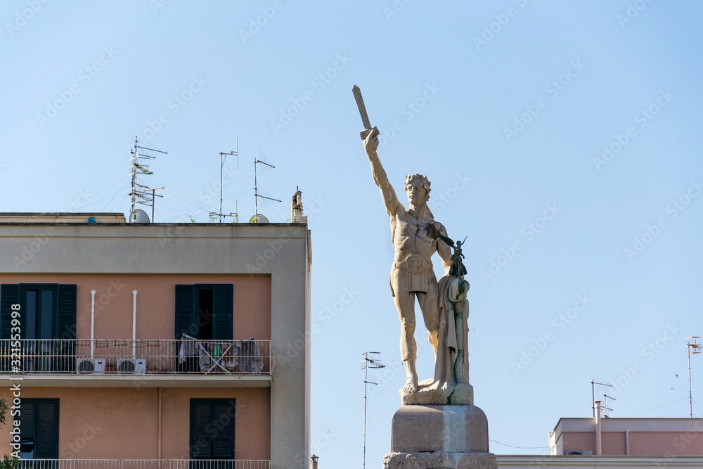 Fototapeta premium Victor Emmanuel II of Italy statue, king of Sardinia and united Italy, blue clear sky background