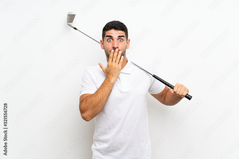 Handsome young golfer player man over isolated white background with surprise facial expression Handsome young golfer player man over isolated white background with surprise facial expression