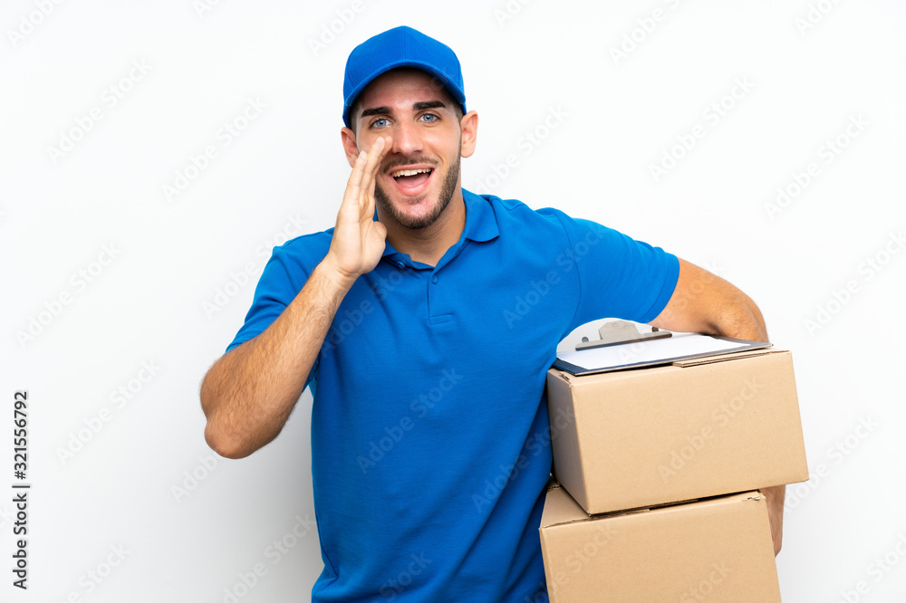 Delivery man over isolated white background shouting with mouth wide open Delivery man over isolated white background shouting with mouth wide open